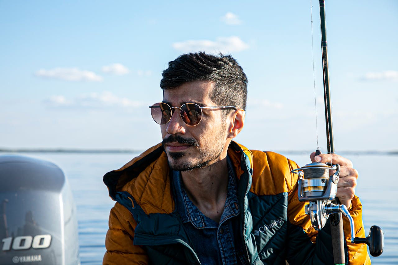 A portrait of a man sitting in a boat